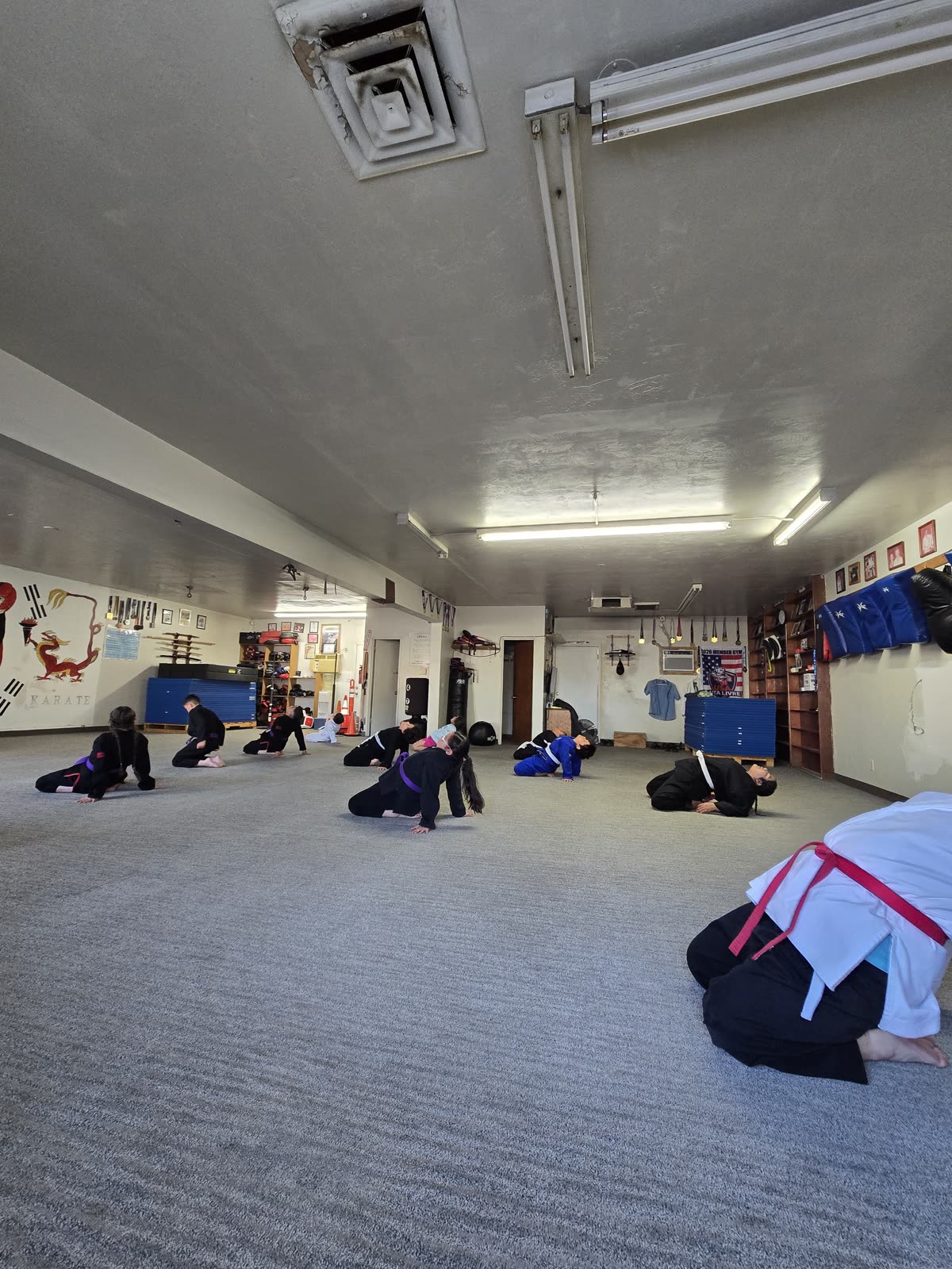 Class warming up on the mat